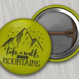 One Inch Round Buttons- with a green background and a Take a walk to the mountains logo