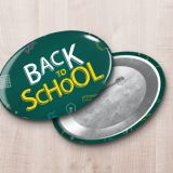 Green Oval Pin Back Button With Back to School Logo